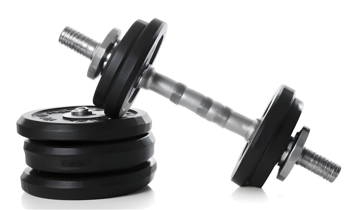 A Pair Of Black Metal Dumbbells With Weight Plates Stacked On A Dark Surface 6 A40b