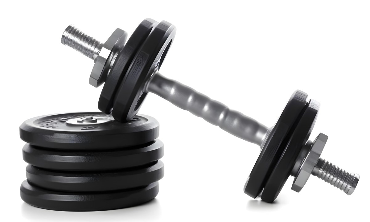 A Pair Of Black Metal Dumbbells With Weight Plates Stacked On A Dark Surface 8 C0c8