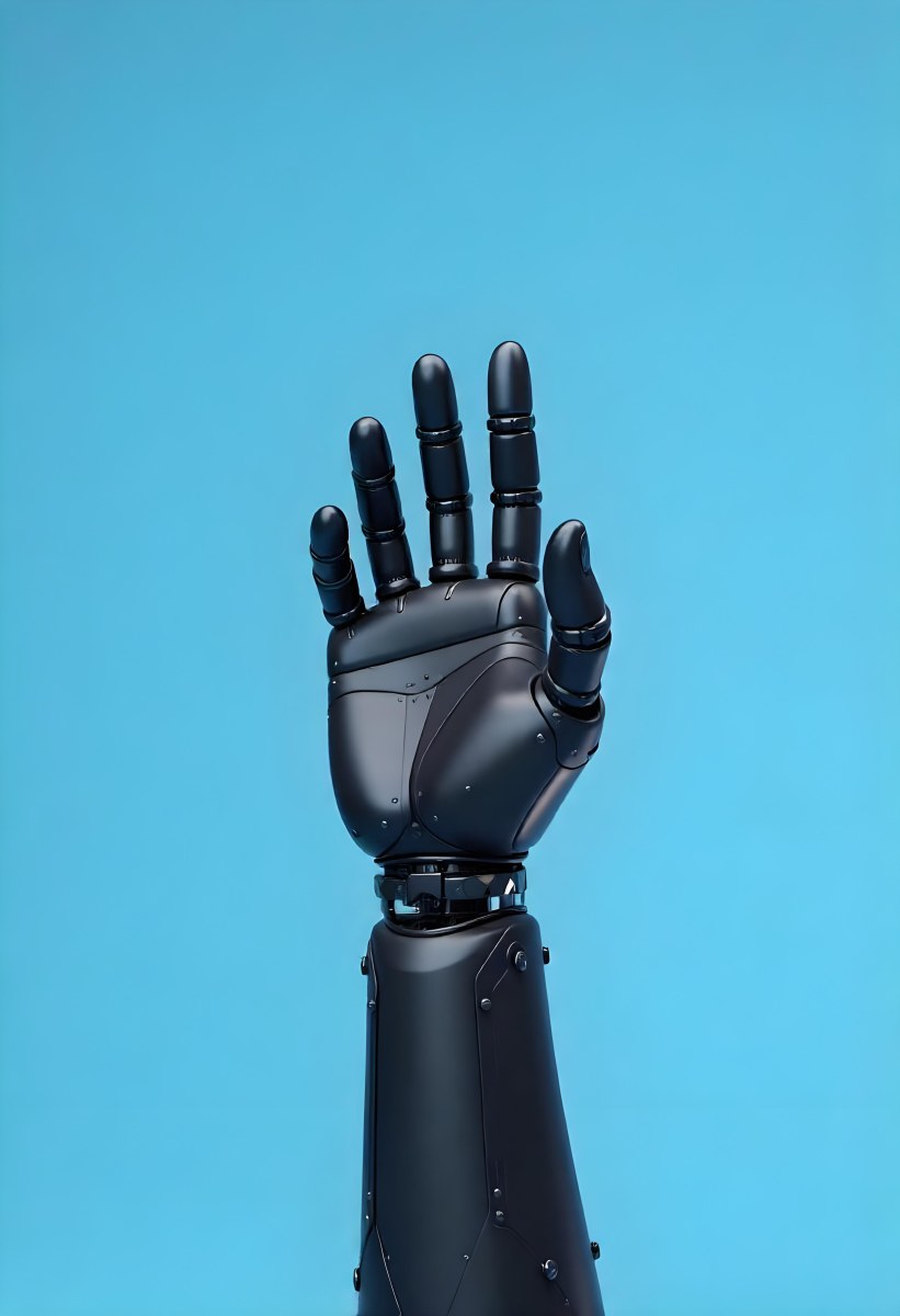 A Black Robotic Hand With Metallic Details Palm Facing Forward Fingers Slightly Curled Against A Solid Light Blue Background 23 D03e
