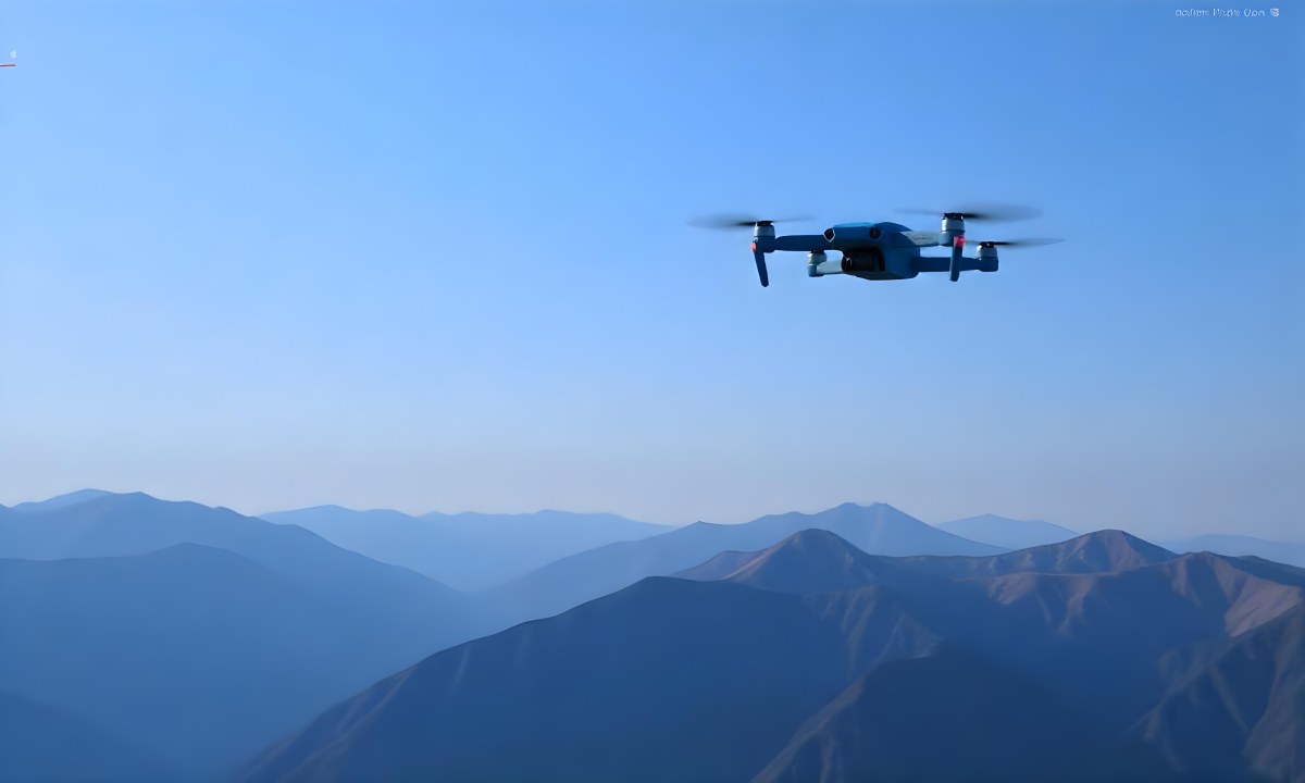 A Blue Drone Flying Over The Mountains With Mountains In The Background And A Clear Blue Sky 21 67da