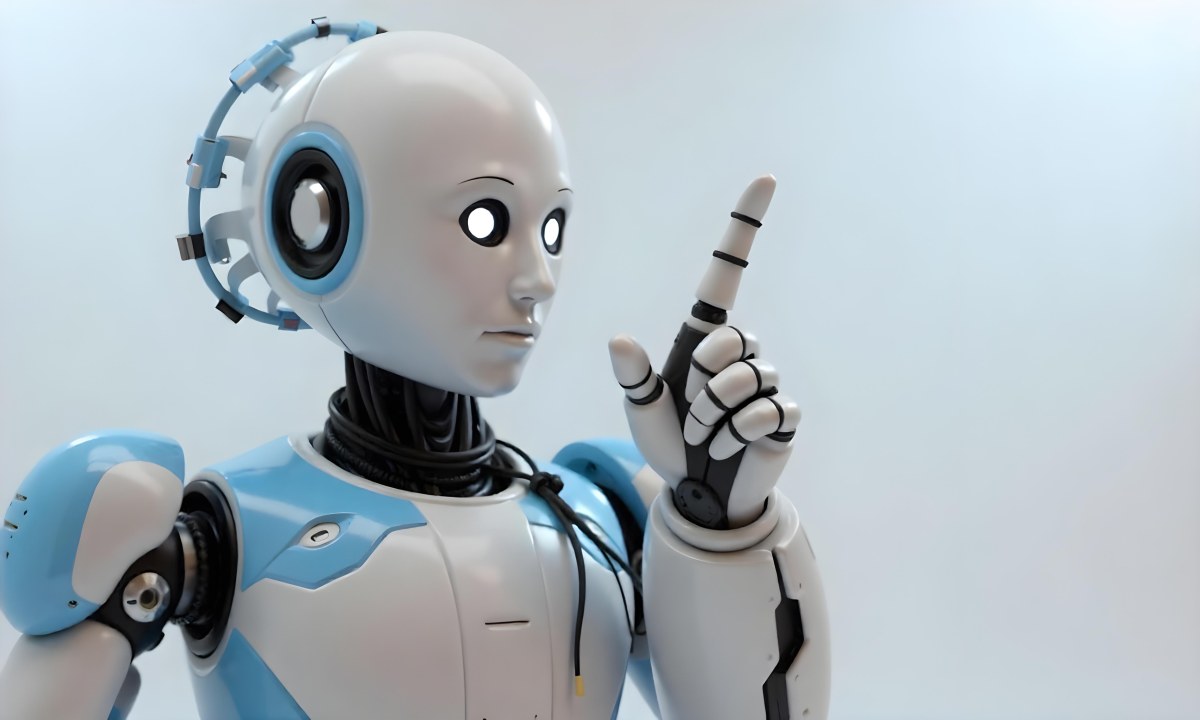 A Blue Humanoid Robot With Black Neck Cables Pointing Up With His Right Index Finger White Background 4 Cb85