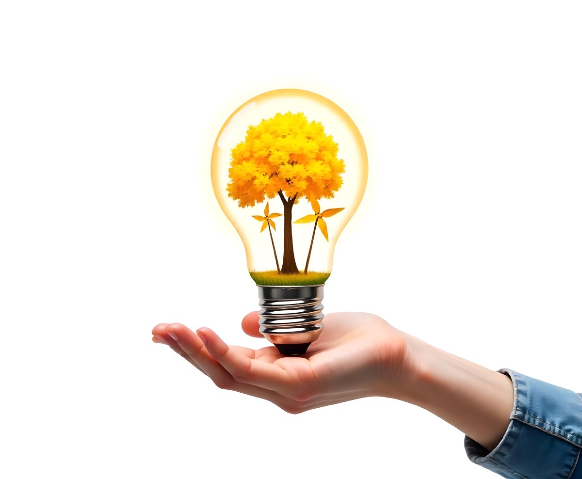 A Hand Holding A Light Bulb With A Tree And Two Windmills Inside The Background Is Plain White 90 09c1