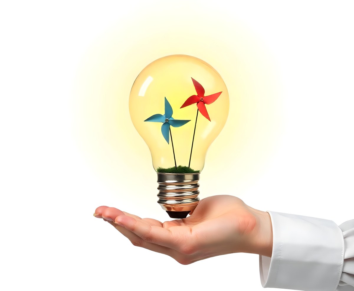 A Hand Holding A Light Bulb With A Tree And Two Windmills Inside The Background Is Plain White 91 1980