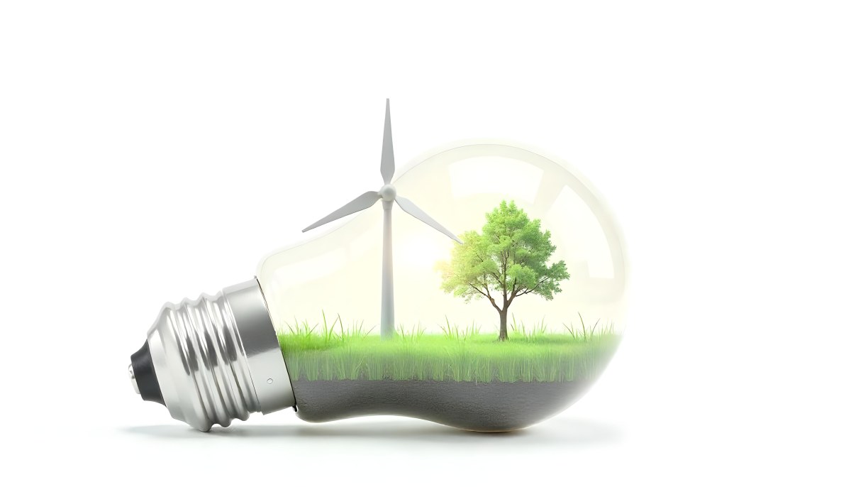 Light Bulb With Solar Panel On Top A Wind Turbine And A Tree Inside Green Grass White Background 27 8a80