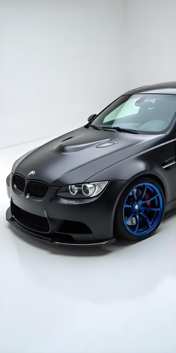 A Black Bmw M3 E92 With A Wide Body Kit Blue Rims And A Carbon Fiber Front Lip Studio Background 28 251f