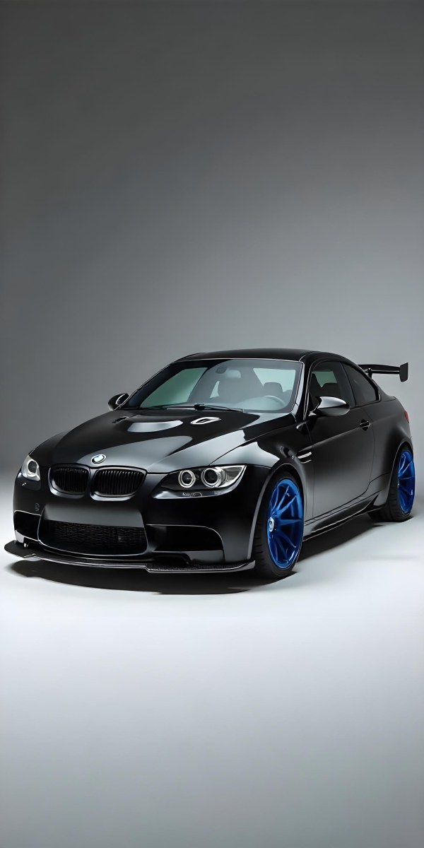 A Black Bmw M3 E92 With A Wide Body Kit Blue Rims And A Carbon Fiber Front Lip Studio Background 32 9172