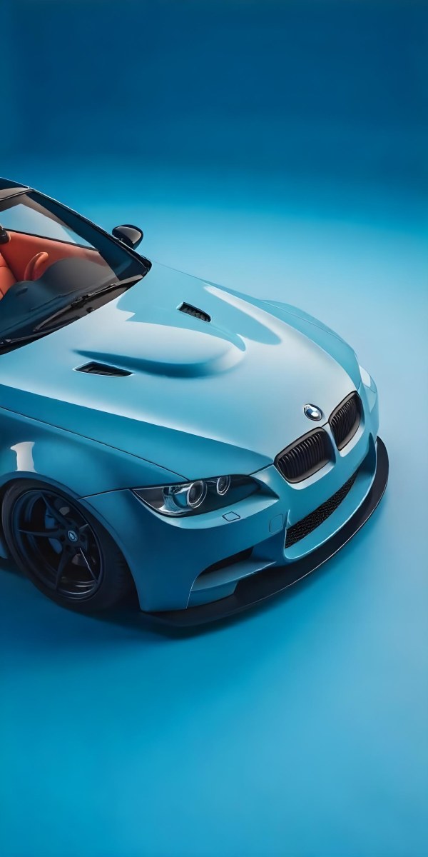 A Black Bmw M3 E92 With A Wide Body Kit Blue Rims And A Carbon Fiber Front Lip Studio Background 6 F35d