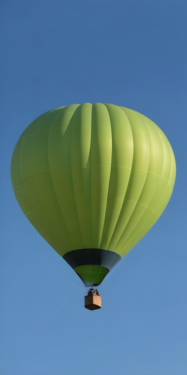 A Blue Hot Air Balloon With A Blue Base Against A Clear Blue Sky The Balloon Is Brightly Lit And Appears To Be Floating 10 0464