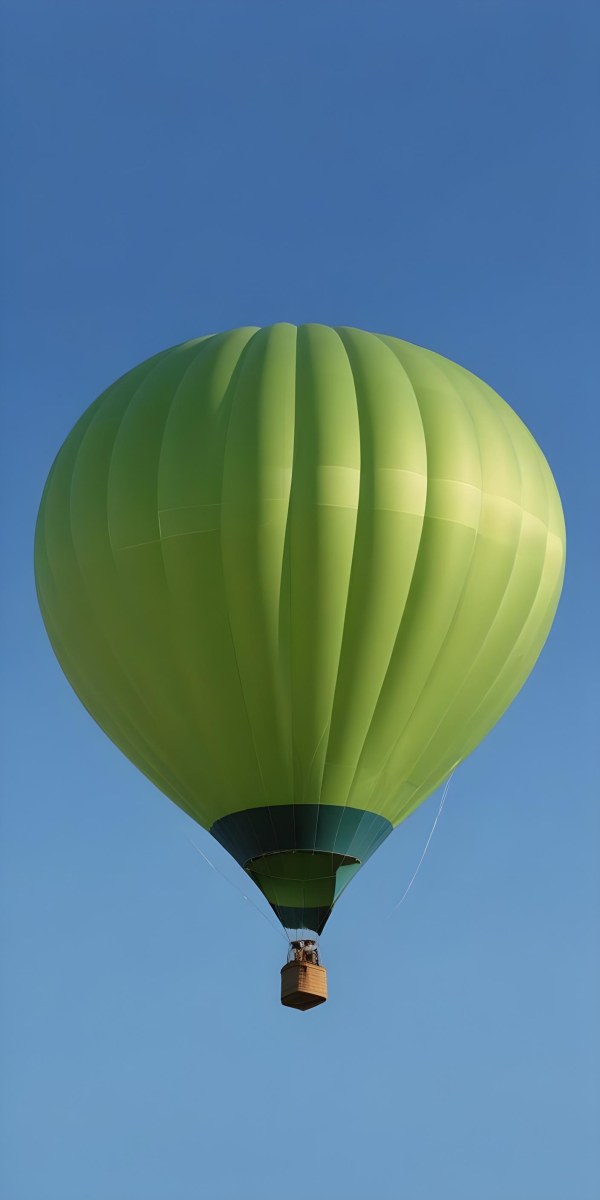 A Blue Hot Air Balloon With A Blue Base Against A Clear Blue Sky The Balloon Is Brightly Lit And Appears To Be Floating 23 A20a