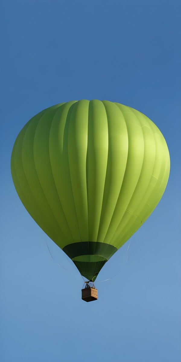 A Blue Hot Air Balloon With A Blue Base Against A Clear Blue Sky The Balloon Is Brightly Lit And Appears To Be Floating 35 405c