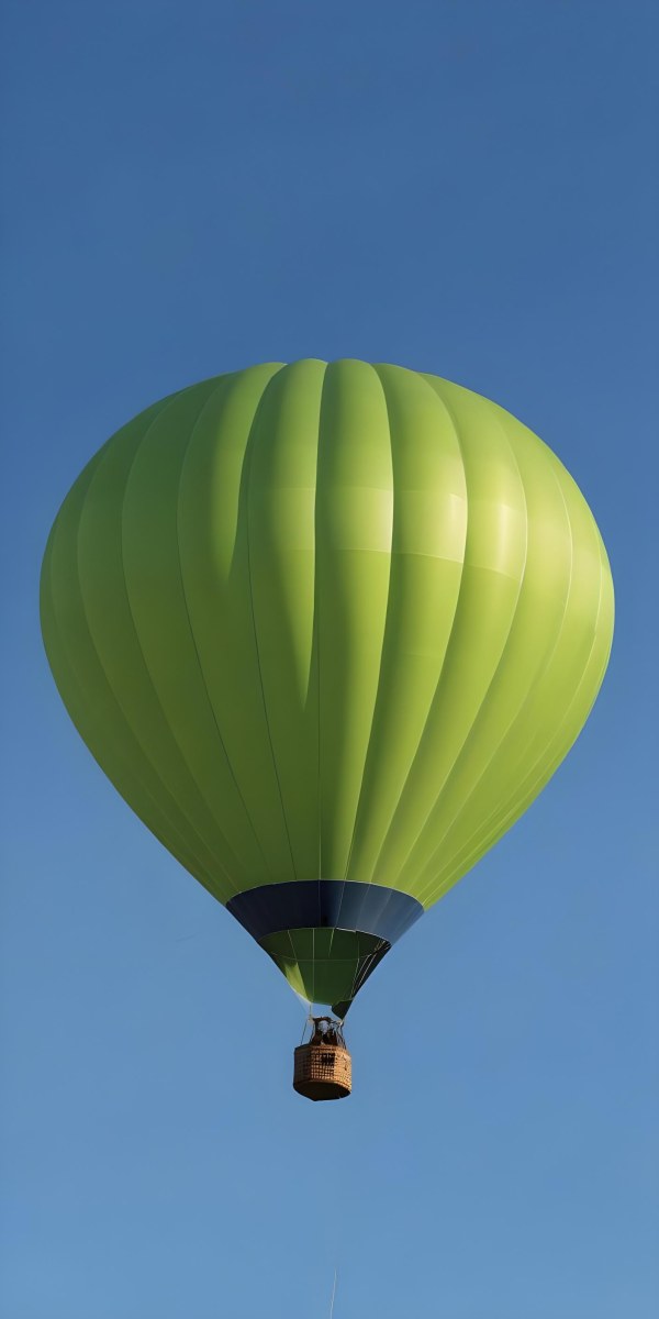 A Blue Hot Air Balloon With A Blue Base Against A Clear Blue Sky The Balloon Is Brightly Lit And Appears To Be Floating 36 D925
