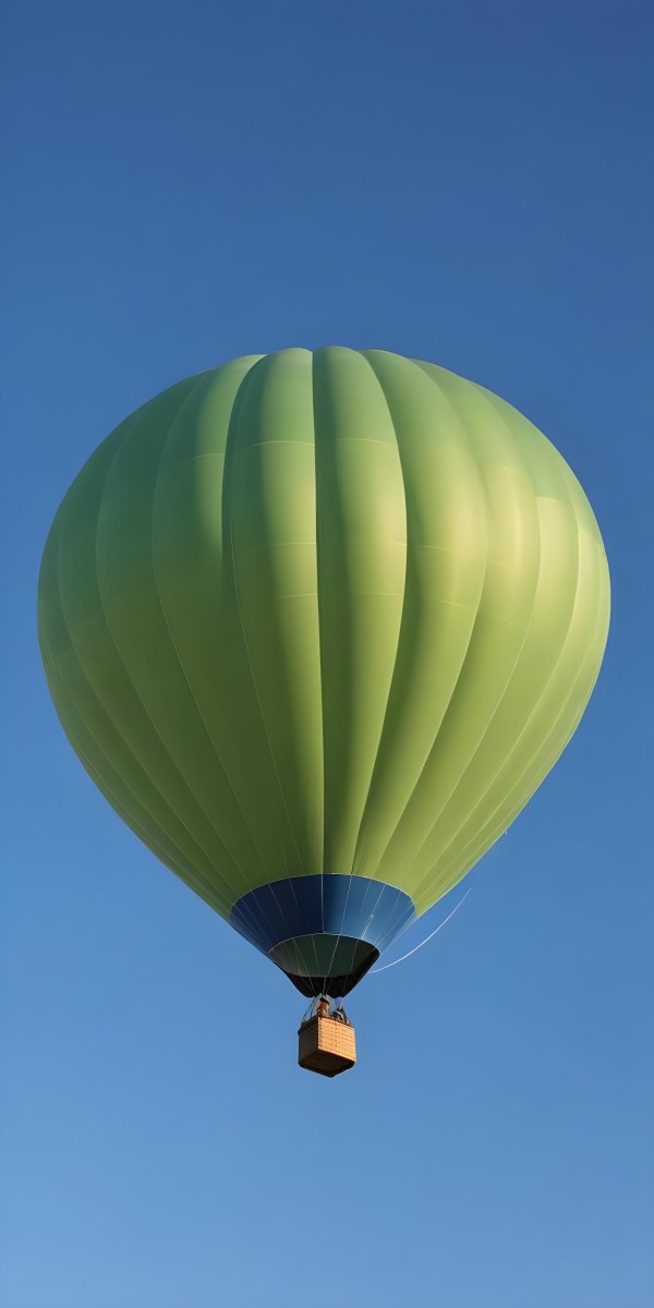 A Blue Hot Air Balloon With A Blue Base Against A Clear Blue Sky The Balloon Is Brightly Lit And Appears To Be Floating 7 413f