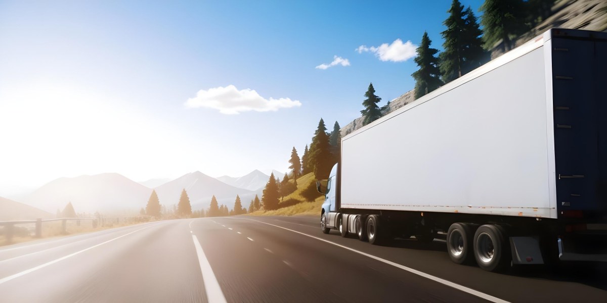 A Blue Semi Truck Driving On A Road With Mountains And Trees In The Background Sunny Day Blue Sky Motion Blur 23 6d1a