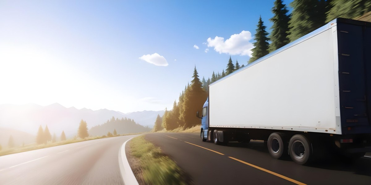 A Blue Semi Truck Driving On A Road With Mountains And Trees In The Background Sunny Day Blue Sky Motion Blur 27 41c3