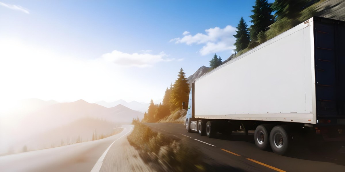 A Blue Semi Truck Driving On A Road With Mountains And Trees In The Background Sunny Day Blue Sky Motion Blur 29 12cf
