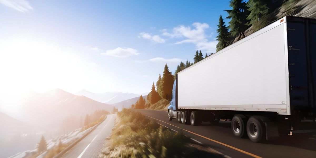 A Blue Semi Truck Driving On A Road With Mountains And Trees In The Background Sunny Day Blue Sky Motion Blur 5 0894