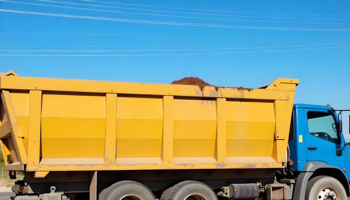 A Long Silver Truck On The Road The Trailer Is Reflective Like A Mirror Sunset Sky In The Background 596 0ce3