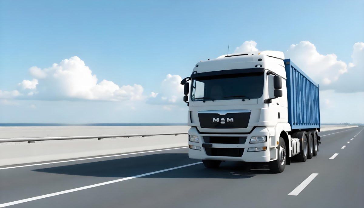 A White Truck On An Asphalt Road With A White Grille And A Blue Container Under A Blue Sky With White Clouds 30 7bb7
