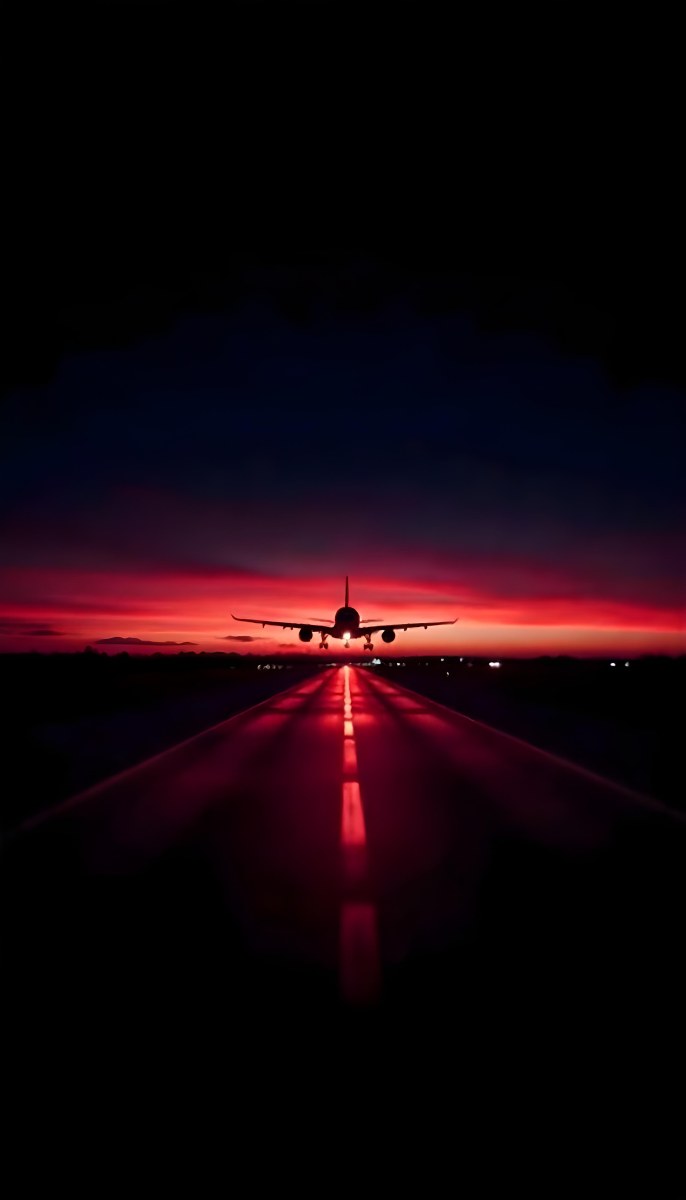 Airplane On A Runway At Night Red And Black Color Palette The Sky Is Dark With A Red Glow Dramatic Lighting 3 2a33