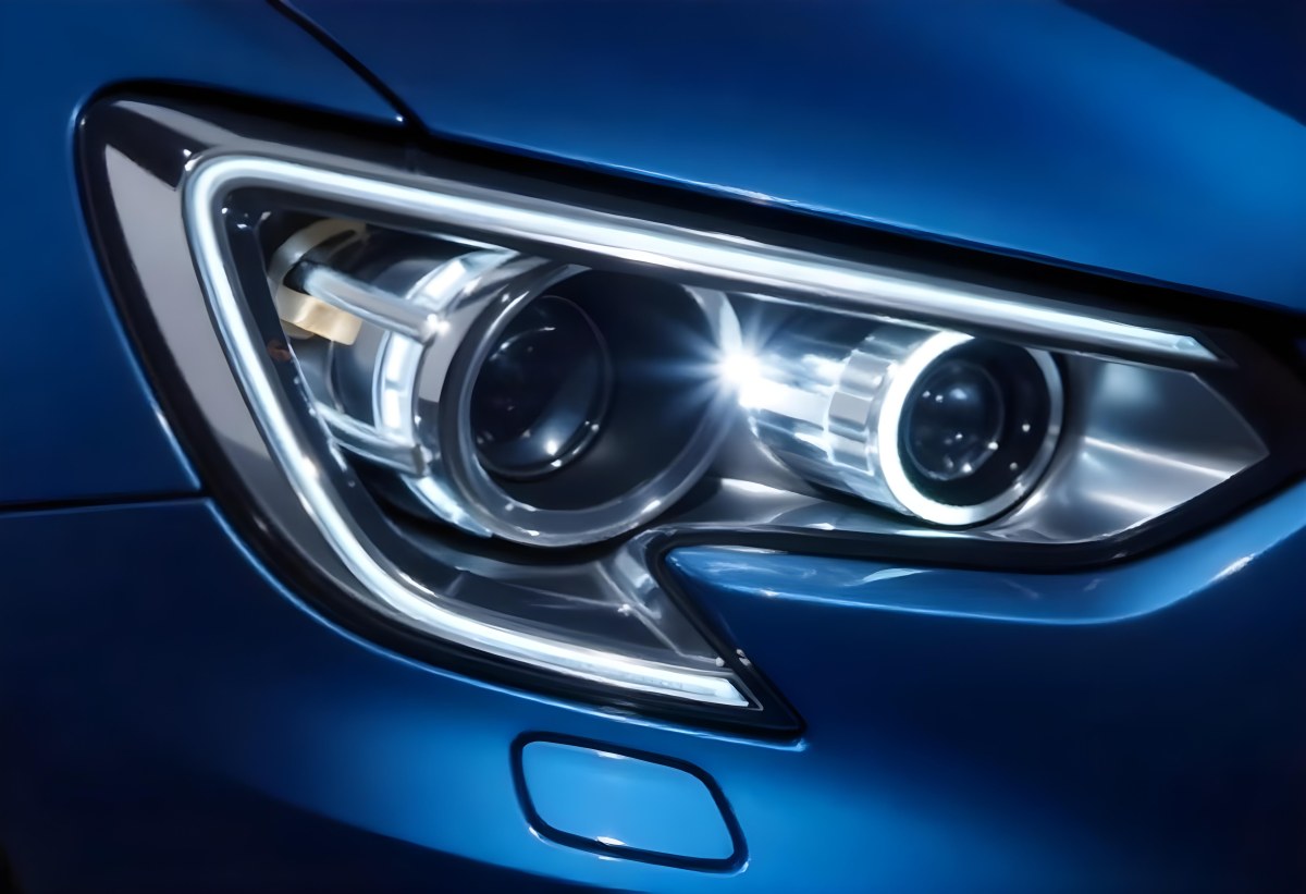 Car Headlight With Chrome Trim And Led Lights Blue Car Paint In The Background Close Up Shot 53 3837