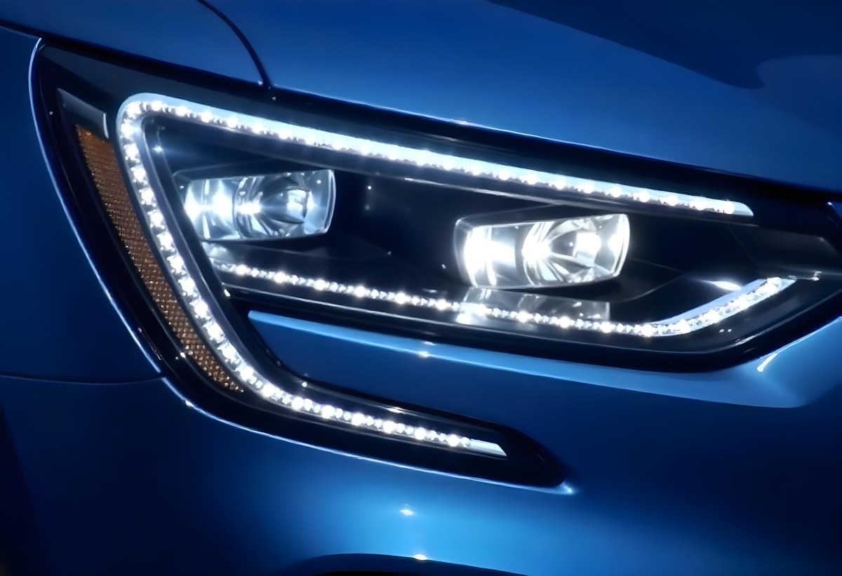 Car Headlight With Chrome Trim And Led Lights Blue Car Paint In The Background Close Up Shot 8 5cc7