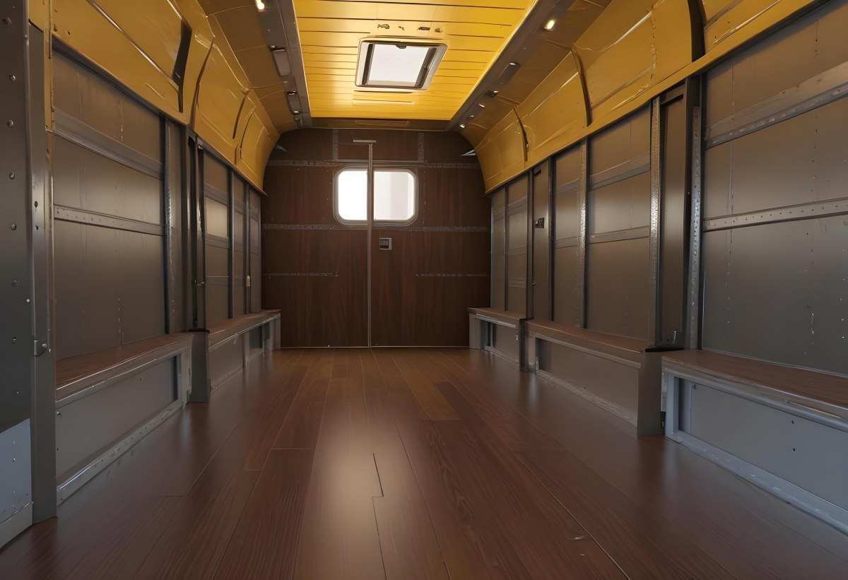 Inside Of An Empty Semi Truck Trailer With Brown Floor And Metal Walls Yellow Ceiling Wooden Door At The End 12 15c0
