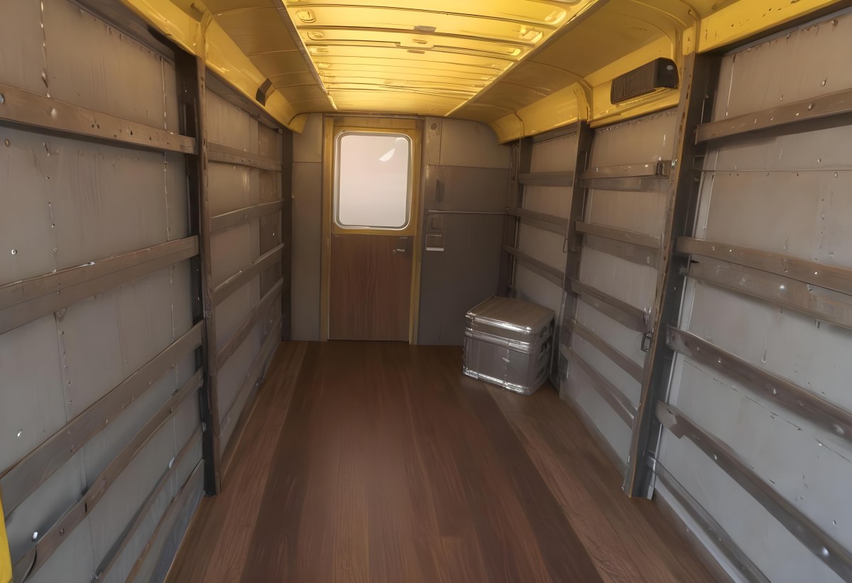 Inside Of An Empty Semi Truck Trailer With Brown Floor And Metal Walls Yellow Ceiling Wooden Door At The End 4 2e16