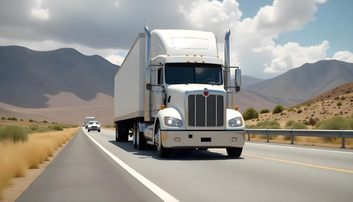 White Semi Truck On A Highway With Mountains In The Background Cloudy Sky Other Cars In The Distance Sunny Day Asphalt Road 41 3382