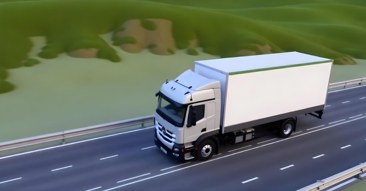 White Truck On The Road With A Green Container Green Hills In The Background Sunny Day Commercial Transport Highway 3 56cb