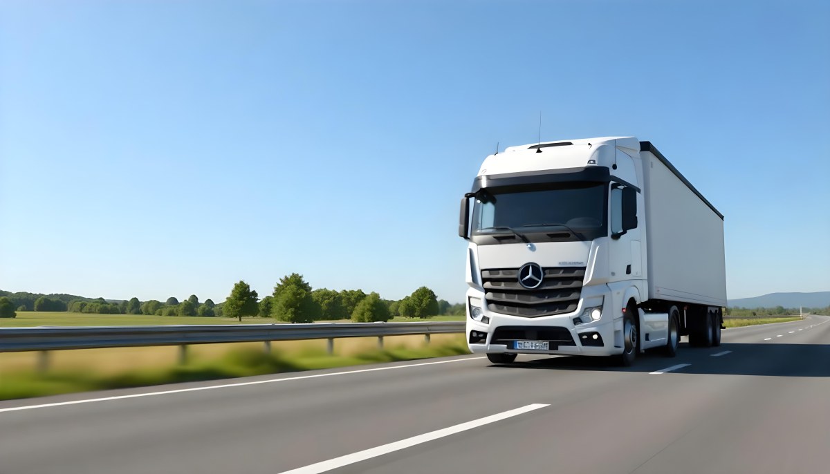White Volvo Truck On The Highway Green Grass And Trees In The Background Clear Blue Sky Sunny Day Highway 5 F2a5