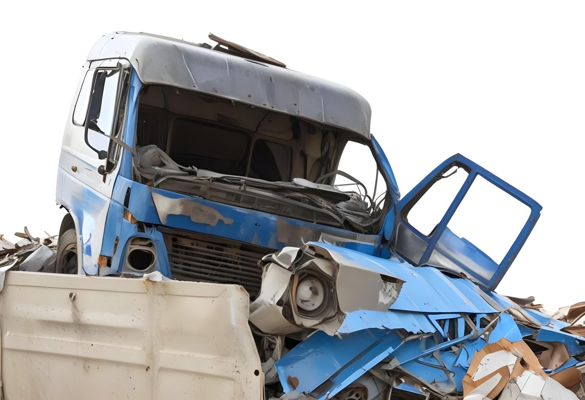 Wrecked White Truck With A Smashed Cabin And A Load Of Metal Sheets Isolated On A White Background Showing The Aftermath Of A Severe Accident 1 E0d5