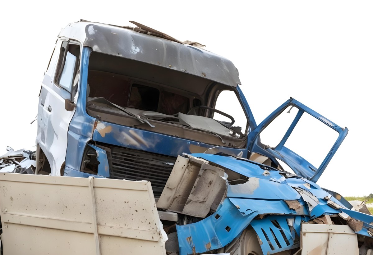 Wrecked White Truck With A Smashed Cabin And A Load Of Metal Sheets Isolated On A White Background Showing The Aftermath Of A Severe Accident 9 0092