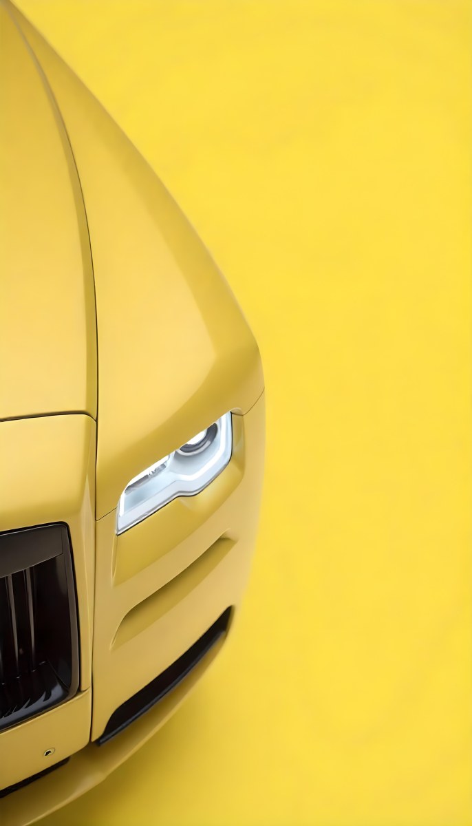 Yellow Rolls Royce Front View Headlight On Yellow Background 6 3156