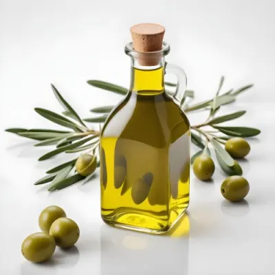 A Glass Bottle Of Olive Oil With Green Olives On The Side 62 Ae96