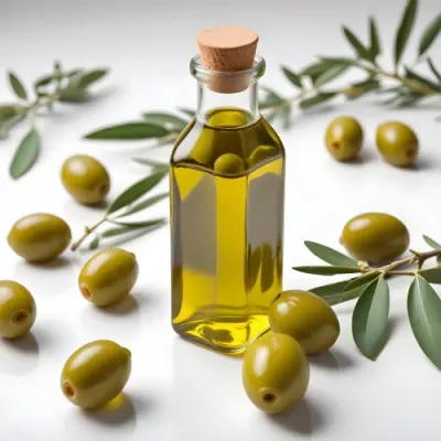 A Glass Bottle Of Olive Oil With Green Olives On The Side 63 677a