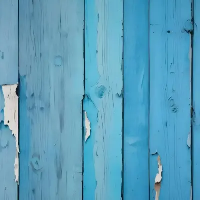 A Blue Wooden Wall With Peeling Paint The Wood Grain Is Visible The Paint Is Chipped And Faded The Background Is A Solid Blue Color 18 Efd7