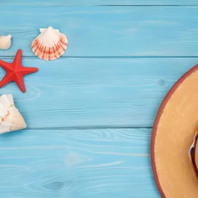 A Red Starfish Seashells And A Straw Hat On A Blue Wooden Background Summer Vacation Concept Beach Theme Top View Flat Lay 15 B748