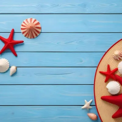 A Red Starfish Seashells And A Straw Hat On A Blue Wooden Background Summer Vacation Concept Beach Theme Top View Flat Lay 5 6069