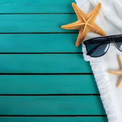 A Starfish And Sunglasses On A White Towel On A White Wooden Surface Beach Vacation Concept Summer Vacation Tropical Bright Colors High Angle View 5 D291