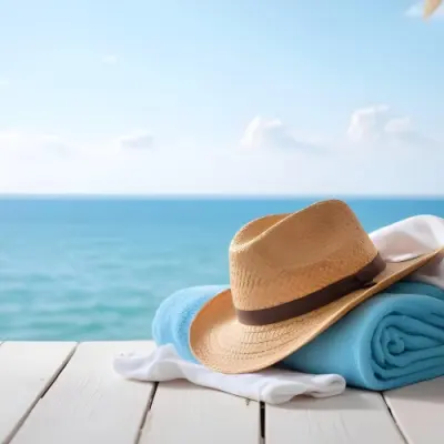 A Straw Hat And A White Towel On A White Wooden Table With A Blurred Background Of The Sea And The Sky 14 88dc