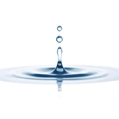 A Water Drop Falling Into A Body Of Water Creating Ripples Isolated On A White Background Studio Shot High Speed Photography 1 4958