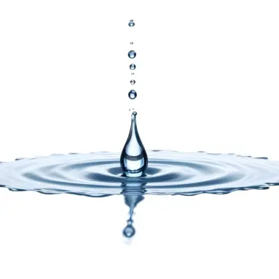 A Water Drop Falling Into A Body Of Water Creating Ripples Isolated On A White Background Studio Shot High Speed Photography 17 7f9e