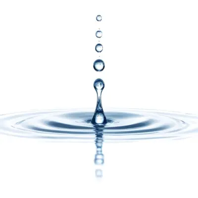 A Water Drop Falling Into A Body Of Water Creating Ripples Isolated On A White Background Studio Shot High Speed Photography 34 9e3f