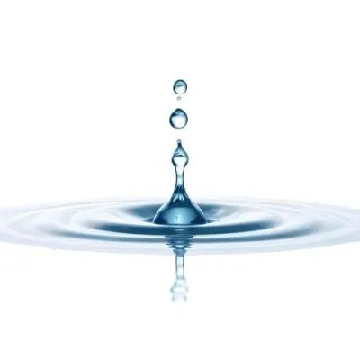 A Water Drop Falling Into A Body Of Water Creating Ripples Isolated On A White Background Studio Shot High Speed Photography 36 31da