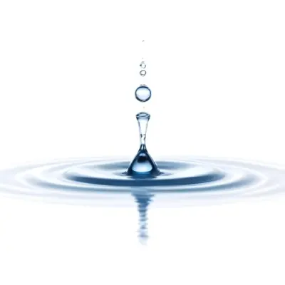 A Water Drop Falling Into A Body Of Water Creating Ripples Isolated On A White Background Studio Shot High Speed Photography 38 0cd3