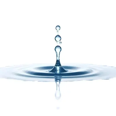 A Water Drop Falling Into A Body Of Water Creating Ripples Isolated On A White Background Studio Shot High Speed Photography 4 2f0e