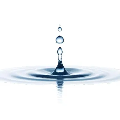 A Water Drop Falling Into A Body Of Water Creating Ripples Isolated On A White Background Studio Shot High Speed Photography 6 9db1