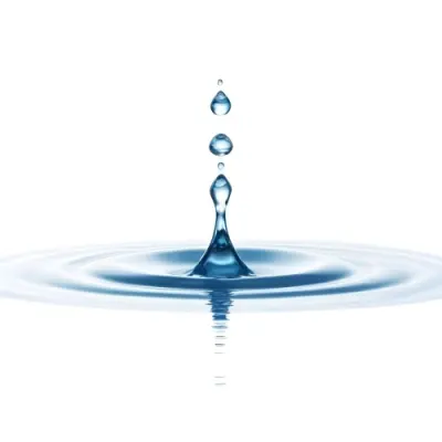 A Water Drop Falling Into A Body Of Water Creating Ripples Isolated On A White Background Studio Shot High Speed Photography 7 F5b6