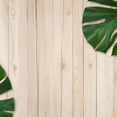 Two Green Monstera Leaves On The Corners Of A Wooden Planks Background Light Brown Color Vertical Lines Natural Light 27 9673
