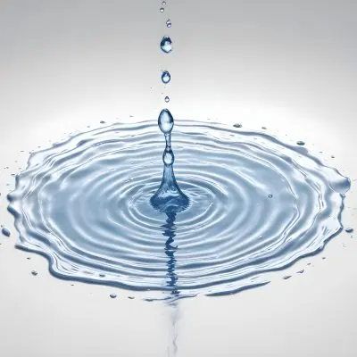 Water Drops Falling Into A Pool Of Water Creating Ripples Isolated On A White Background Clean And Minimalist High Resolution 1 3397
